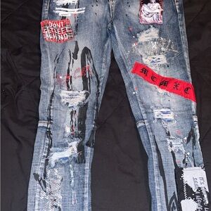 AMIRI Blue and Red Skinny Jeans with Distressed Design